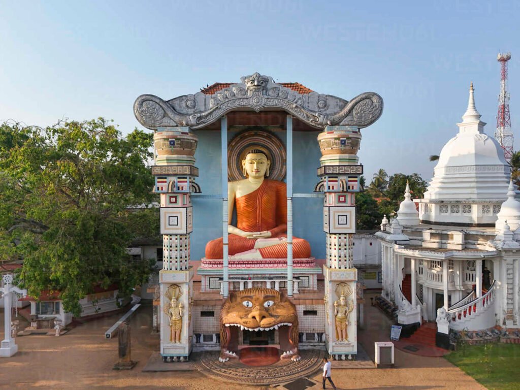 Aerial view of Angurukaramulla Temple with ornate Buddha statue, Negombo, Sri Lanka.
